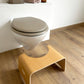 Tabouret en bois verni avec poignées